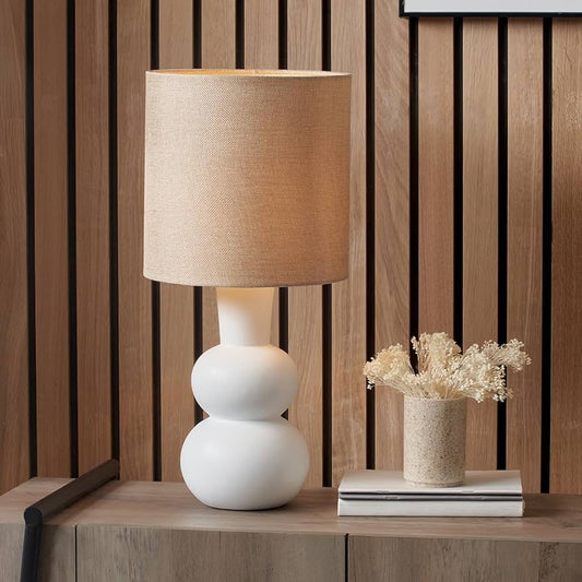 Serenity Curve Table Lamp on bedside table with linen shade